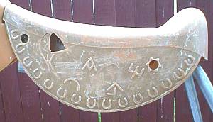 closeup of saddle showing damage